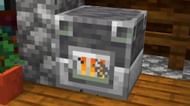 A blast furnace giving off its own light source (Image via YouTube/OMGCraft)